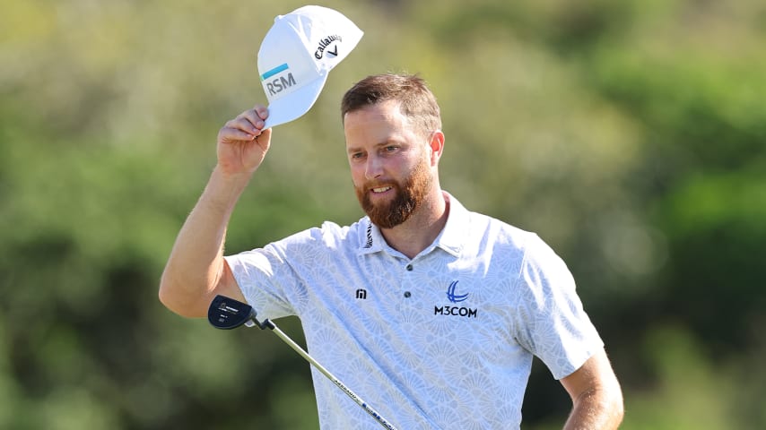 Chris Kirk celebrates after winning on the 18th green during the final round of The Sentry. (Michael Reaves/Getty Images)