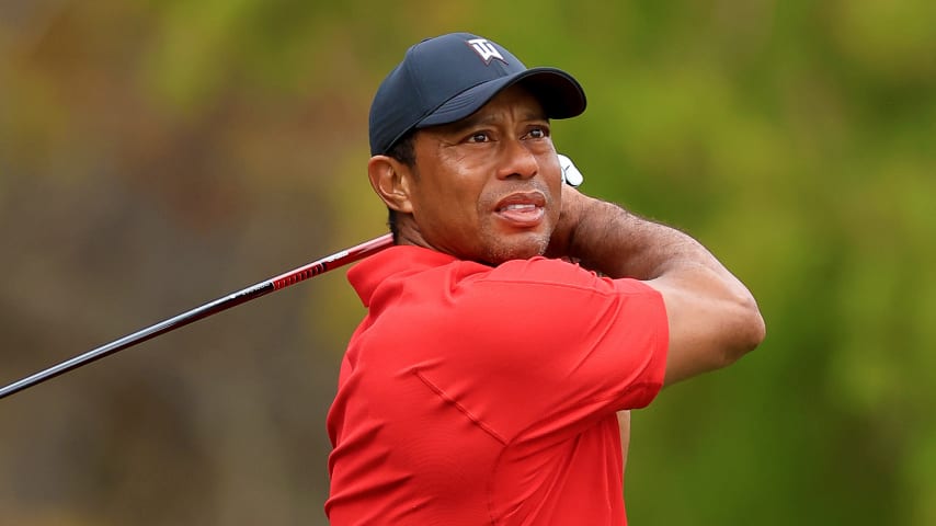 Tiger Woods plays his tee shot during the final round of the PNC Championship. (David Cannon/Getty Images)