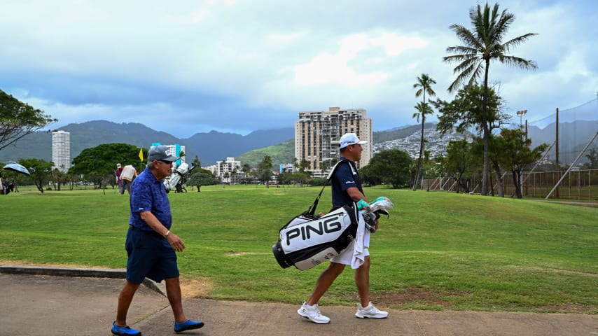 Chan Kim with his coach Les Uyehara at his course as a young player, Ala Wai Golf Course, prior to Sony Open in Honolulu, Hawaii. (Tracy Wilcox/PGA TOUR)