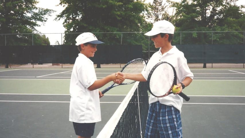 Tom Whitney (L) and Bob Whitney (R) playing tennis. (Photo courtesy of Whitney family)