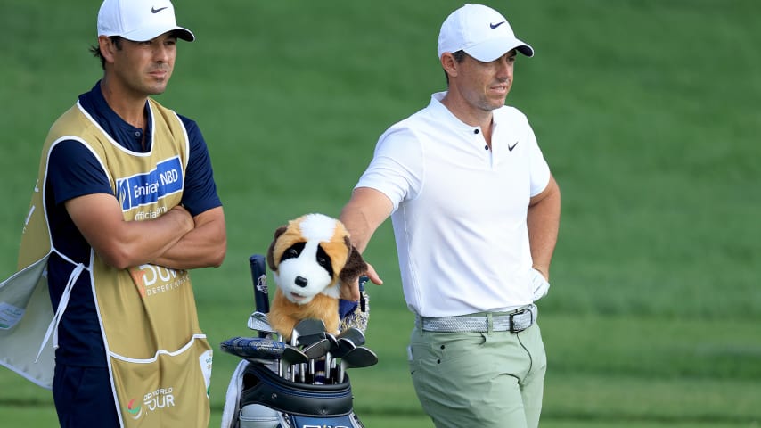 Rory McIlroy with his caddie Harry Diamond during the final round of the Hero Dubai Desert Classic. (David Cannon/Getty Images)