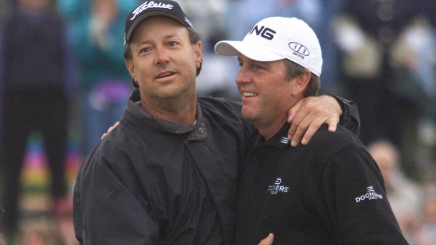 Mark Calcavecchia is congratulated by his caddie Drake Oddy after winning the 2001 Phoenix Open. (Craig Jones/ALLSPORT)