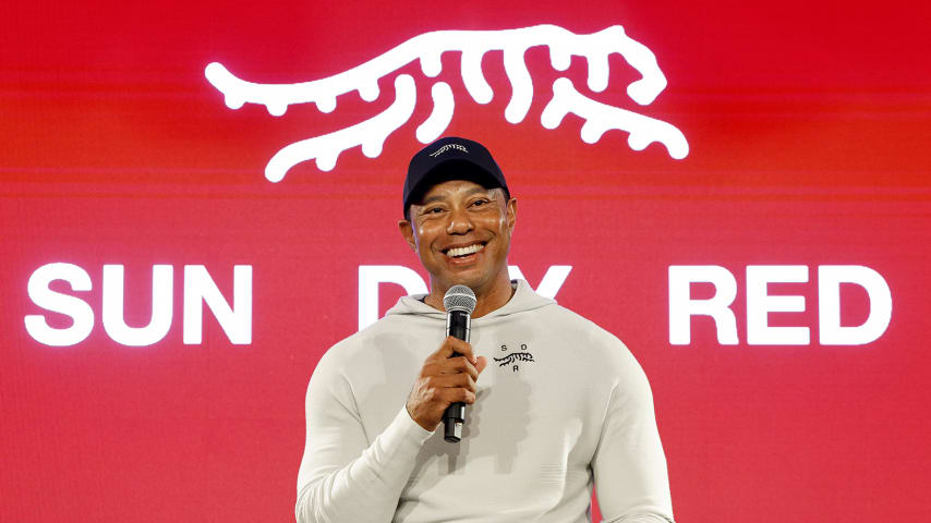 Tiger Woods speaks during the launch of "Sun Day Red" his new clothing line. (Kevork Djansezian/Getty Images)