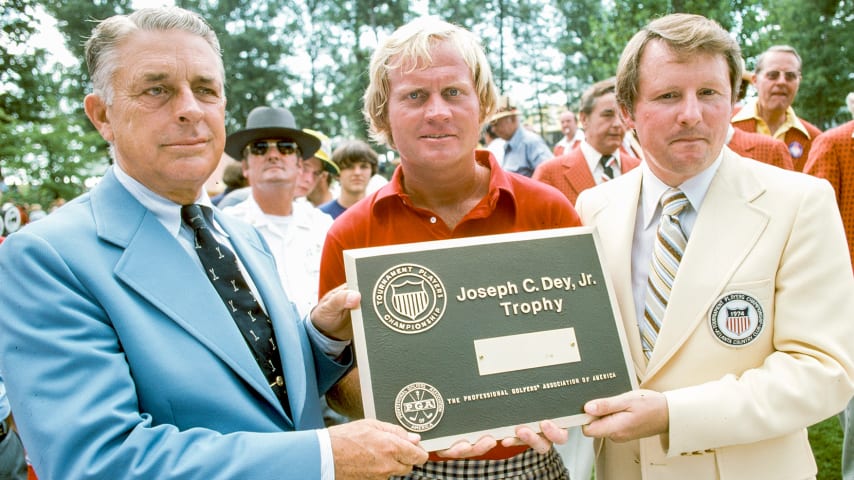 Jack Nicklaus (center) accepts the trophy from PGA TOUR Commissioner Deane Beman (right) and Joe Dey after winning THE PLAYERS 1974 contested at Atlanta Country Club. (PGA TOUR Archives)