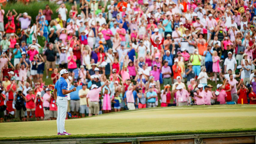 Rickie Fowler celebrates as he wins the playoff in the final round of THE PLAYERS Championship 2015. (Mike Ehrmann/Getty Images)