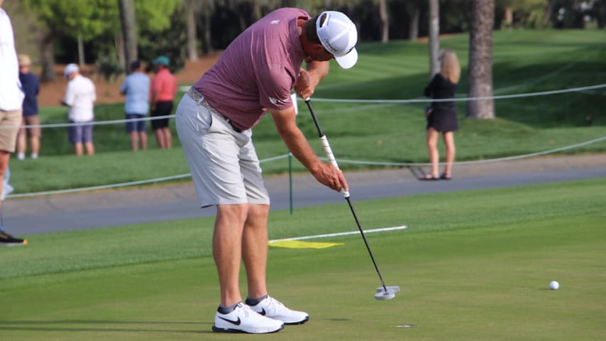 Glover trying out his new L.A.B. Golf DF3 broomstick putter at THE PLAYERS Championship. (Courtesy GolfWRX)