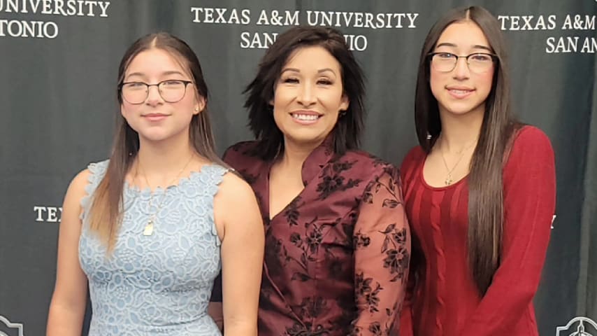 Juanita Sepulveda poses with two of her seven children, daughters Ruth and Magdalene. (Photo courtesy Juanita Sepulveda)