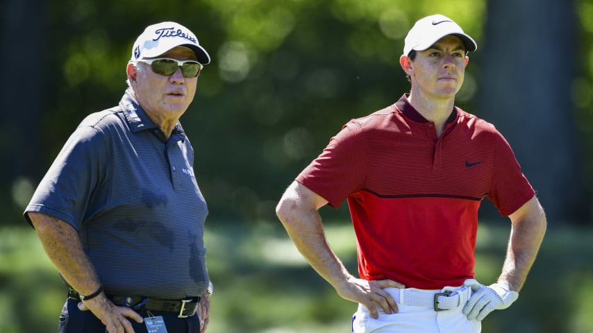 Rory McIlroy (R) talks with Butch Harmon during a practice round prior to the 2016 PGA Championship.  (Stuart Franklin/Getty Images)