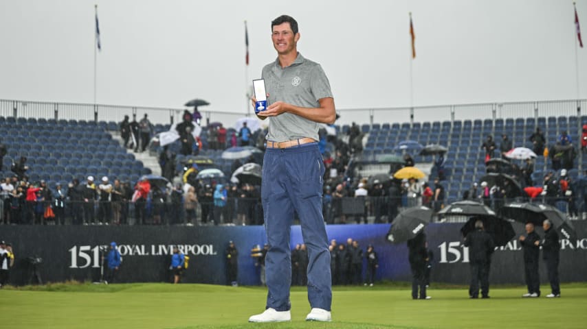 Amateur Christo Lamprecht of South Africa smiles with the silver medal awarded for low amateur honors following the final round of The 151st Open Championship at Royal Liverpool Golf Club. (Keyur Khamar/PGA TOUR)