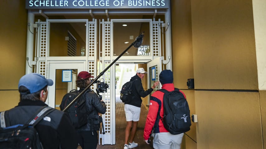 ATLANTA, GEORGIA - NOVEMBER 02:  Christo Lamprecht of South Africa walks to a class in the Scheller College of Business building during a PGA TOUR University shoot at the Georgia Institute of Technology on November 2, 2023 in Atlanta, Georgia. (Photo by Keyur Khamar/PGA TOUR)