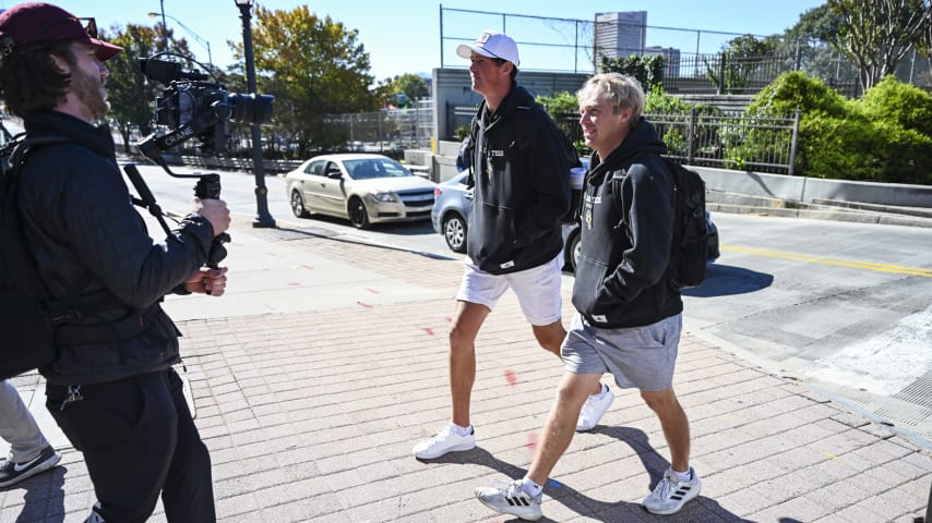 ATLANTA, GEORGIA - NOVEMBER 02:  Christo Lamprecht of South Africa walks to class with golf teammate Adam Bratton at the Georgia Institute of Technology during a PGA TOUR University shoot on November 2, 2023 in Atlanta, Georgia. (Photo by Keyur Khamar/PGA TOUR)