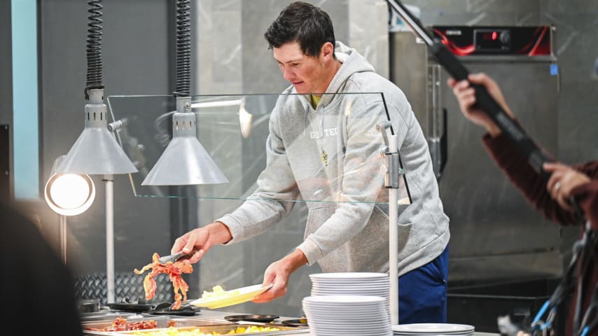 ATLANTA, GEORGIA - NOVEMBER 02:  Christo Lamprecht of South Africa eats breakfast with his golf teammates in the Hugh Spruill Strength Center during a PGA TOUR University shoot at the Georgia Institute of Technology on November 2, 2023 in Atlanta, Georgia. (Photo by Keyur Khamar/PGA TOUR)