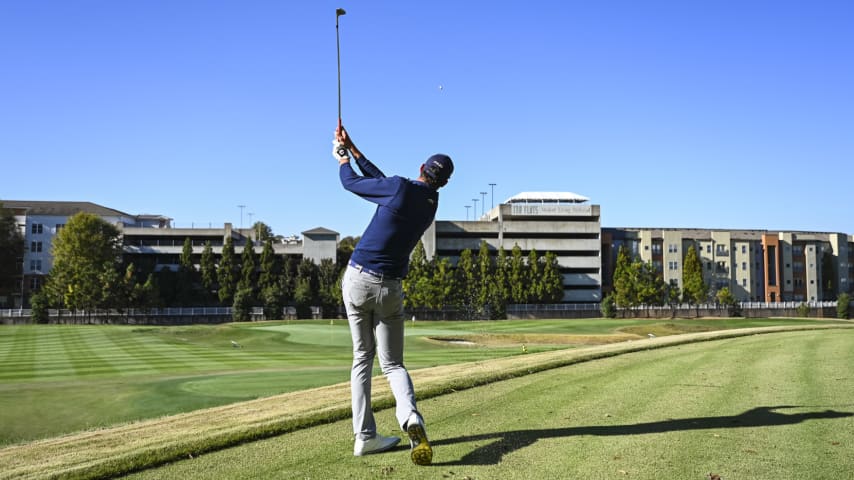 ATLANTA, GEORGIA - NOVEMBER 02:  Christo Lamprecht of South Africa hits a shot on the par 3 course at the Georgia Institute of Technology Golf Practice Facility during a PGA TOUR University shoot on November 2, 2023 in Atlanta, Georgia. (Photo by Keyur Khamar/PGA TOUR)