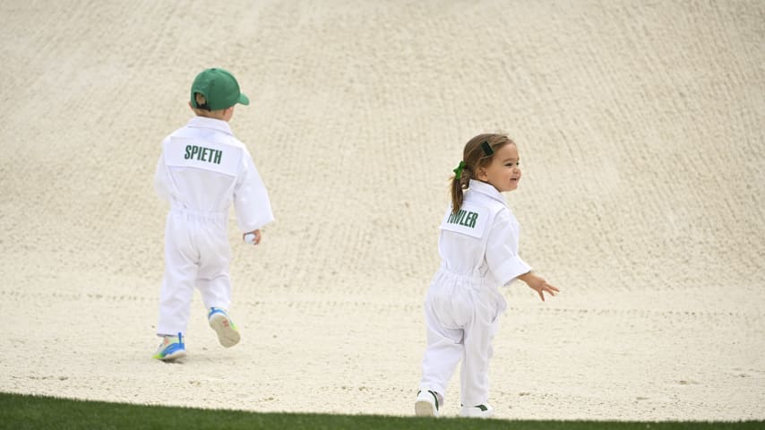 Sammy Spieth and Maya Fowler play in a bunker during the Masters Par 3 Contest. (Ben Jared/PGA TOUR)