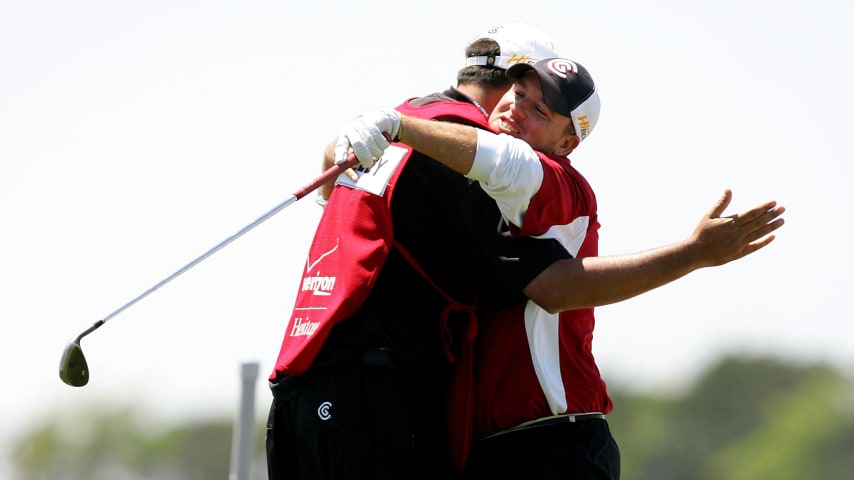 Boo Weekley hugs his caddie as he reacts to chipping in for a par on the 18th green during the final round of the 2007 RBC Heritage at Harbour Town Golf Links. (Streeter Lecka/Getty Images)