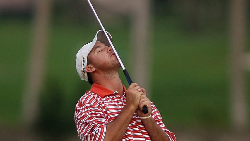 Boo Weekley reacts to missing a winning putt on the 18th hole at PGA National. (Marc Serota/Getty Images)