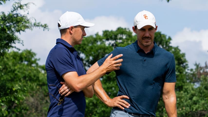 Jordan Spieth chats with Korn Ferry Tour pro Jamie Lovemark on Wednesday at the Veritex Bank Championship. (Bret Clein/PGA TOUR)