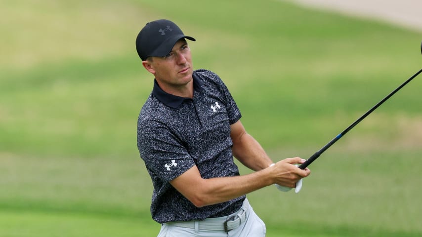 MCKINNEY, TEXAS - APRIL 30: Jordan Spieth hits an approach shot on the ninth hole prior to THE CJ CUP Byron Nelson at TPC Craig Ranch on April 30, 2024 in McKinney, Texas. (Photo by Mike Mulholland/Getty Images for The CJ Cup)