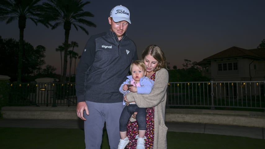 Hayden Springer poses with his family after accepting his PGA TOUR card after the final round of the PGA TOUR Q-School presented by Korn Ferry. (Tracy Wilcox/PGA TOUR)