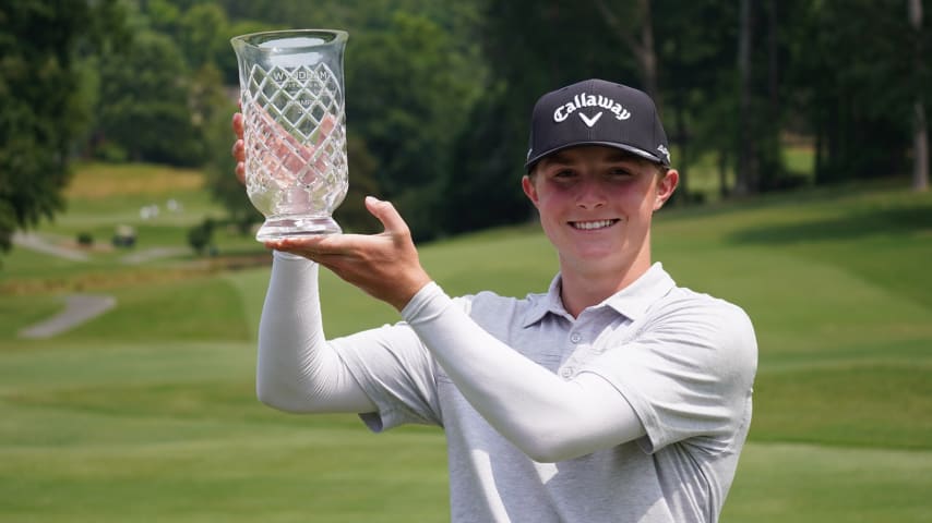 Blades Brown poses with the trophy after winning the 2023 AJGA Wyndham Invitational presented by Odyssey. (Courtesy of American Junior Golf Association)