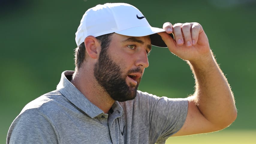 Scottie Scheffler of the United States looks on from the 18th green during the third round of the 2024 PGA Championship at Valhalla Golf Club on May 18 in Louisville, Kentucky. (Michael Reaves/Getty Images)