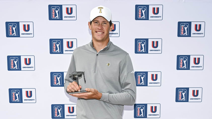 Christo Lamprecht of Georgia Tech smiles with a trophy after finishing second in the PGA TOUR University rankings, securing him fully exempt Korn Ferry Tour membership for the remainder of the 2024 seasonduring the NCAA D1 Men’s Golf Championship on the North Course at the Omni La Costa Resort & Spa on May 27, 2024 in Carlsbad, California. (Keyur Khamar/PGA TOUR)