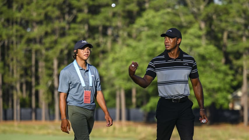 Charlie and Tiger Woods at Pinehurst No. 2 ahead of the 2024 U.S. Open. (Keyur Khamar/PGA TOUR via Getty Images)