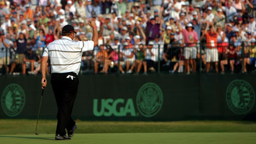 Jason Gore celebrates on the 18th green during round three of the U.S. Open on Pinehurst No. 2 at the Pinehurst Resort on June 18, 2005 in Pinehurst, North Carolina. (Donald Miralle/Getty Images)