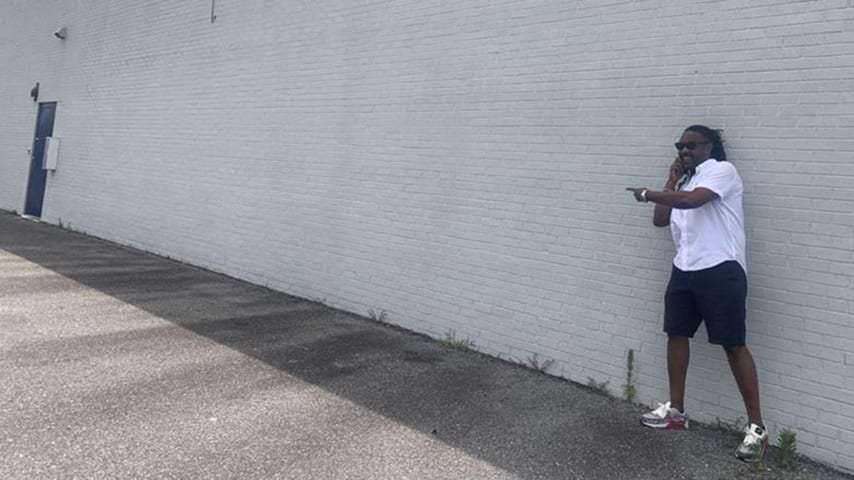 Vincent Ballentine in front of the wall where he will paint the mural honoring The Greensboro Six. (Courtesy Wyndham)