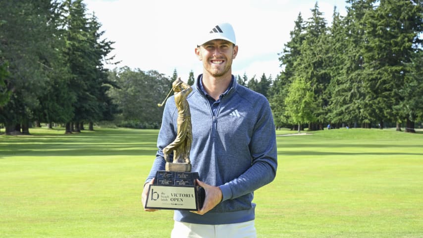 Winner Frederik Kjettrup poses with the trophy after the final round of The Beachlands Victoria Open presented by Times Colonist. (Jennifer Perez/PGA TOUR)