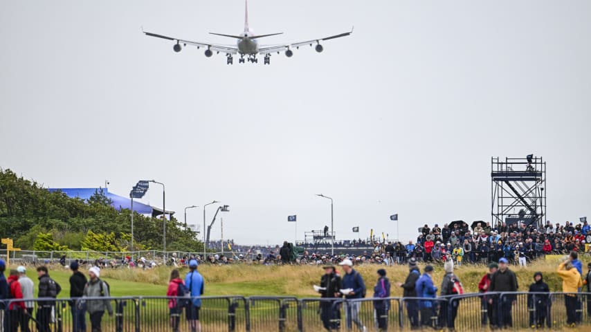 A commercial jet flies over the golf course during the first round of The 152nd Open Championship at Royal Troon on July 18, 2024, in Troon, Scotland. (Keyur Khamar/PGA TOUR via Getty Images)