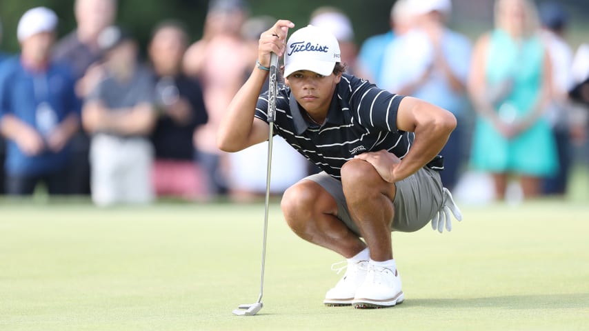 Charlie Woods competes in Monday's opening round of the U.S. Junior Amateur at Oakland Hills. (Raj Mehta/Getty Images)