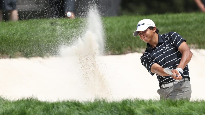 Charlie Woods competes in Monday's opening round of the U.S. Junior Amateur at Oakland Hills. (Raj Mehta/Getty Images)