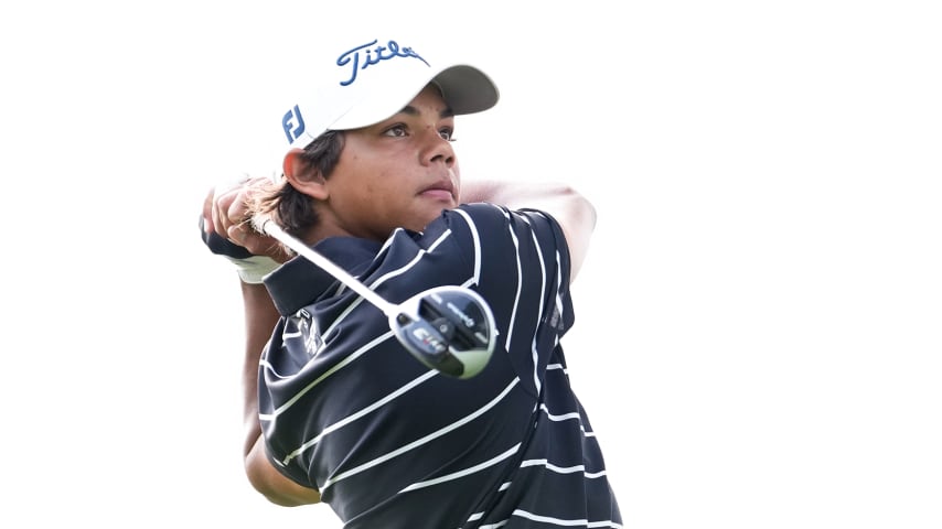 Charlie Woods competes in Monday's opening round of the U.S. Junior Amateur at Oakland Hills. (Raj Mehta/Getty Images)