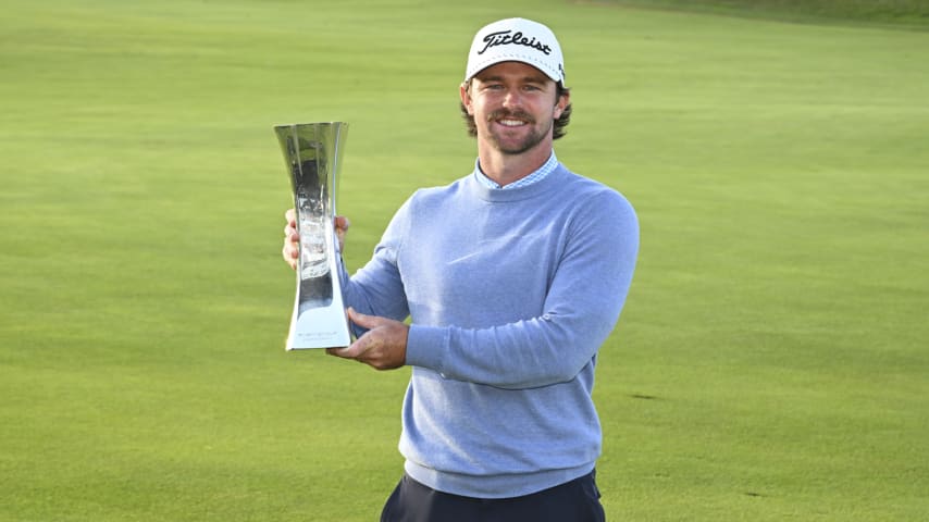 Winner Will Cannon poses with the trophy on the 18th hole after the final round of the PGA TOUR Americas, Fortinet Cup Championship at TPC Toronto (North Course). (Jennifer Perez/PGA TOUR)