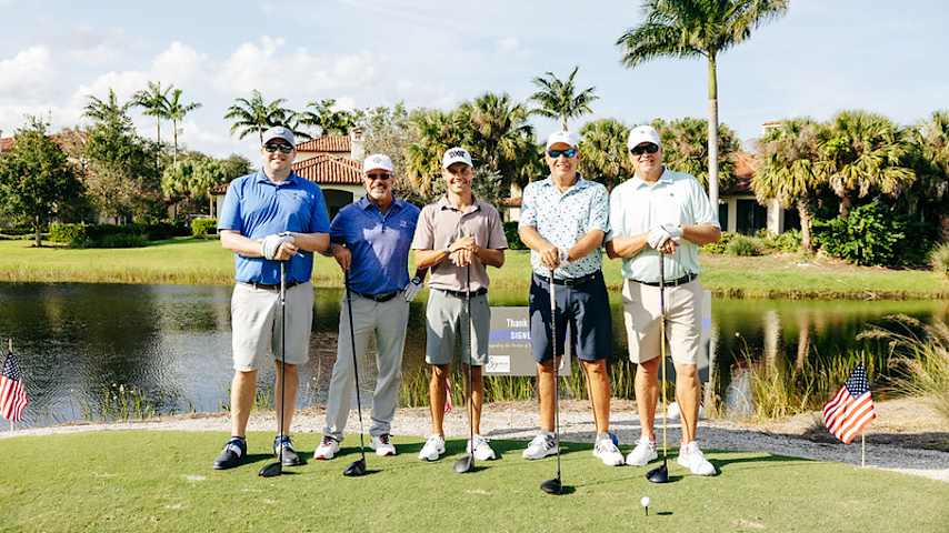 Eric Cole (middle) donated his $50,000 RSM Birdies Fore Love bonus to the McDavid Group Charities. (Credit McDavid Group Charities)