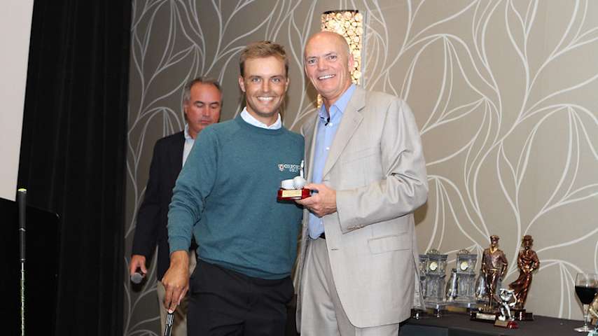 Eric Cole (left) poses with Jim McDavid, the founder of the annual GOLF FOR COPS Pro-Am. (Credit McDavid Group Charities)