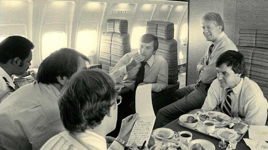 Aboard Air Force One, President Jimmy Carter, along with aides Hamilton Jordan (left) and Tim Smith (right) met with members of the media. (Courtesy Tim Smith)