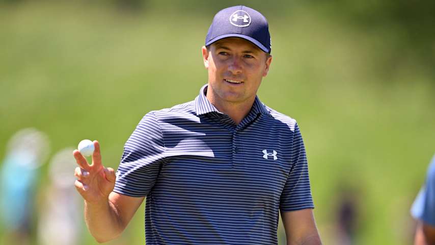MCKINNEY, TEXAS - MAY 04: Jordan Spieth of the United States acknowledges the crowd after a putt during the final round of THE CJ CUP Byron Nelson 2025 at TPC Craig Ranch on May 04, 2025 in McKinney, Texas. (Photo by Orlando Ramirez/Getty Images for The CJ Cup)