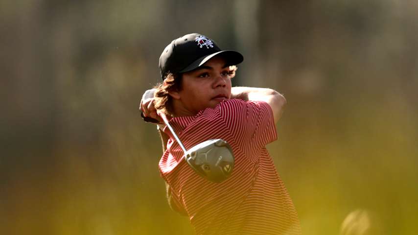 ORLANDO, FLORIDA - DECEMBER 22: Charlie Woods of the United States plays his shot from the 14th tee during the second round of the PNC Championship at Ritz-Carlton Golf Club on December 22, 2024 in Orlando, Florida. (Photo by Douglas P. DeFelice/Getty Images)