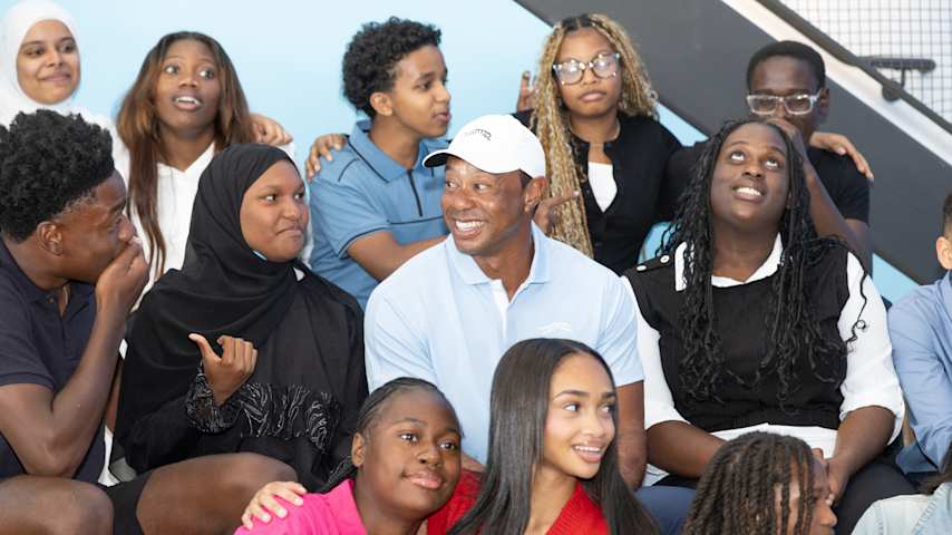 Tiger Woods with students from TGR Learning Lab on the Cobbs Creek Campus in Philadelphia. (William Stickney/Jay Gorodetzer Photography)
