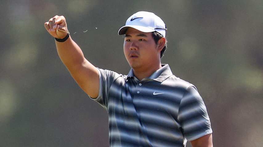 SOUTHAMPTON, NEW YORK - JUNE 21: Tom Kim of South Korea tests the wind on the fifth hole during the final round of the 126th U.S. OPEN at Shinnecock Hills Golf Club on June 21, 2026 in Southampton, New York. (Photo by Mike Mulholland/Getty Images)