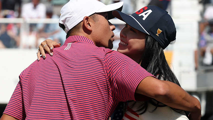 MEDINAH, ILLINOIS - SEPTEMBER 27: Collin Morikawa of the U.S. Team and his wife Katherine hug on the first tee during Sunday's Singles on day four of the Presidents Cup 2026 at Medinah Country Club on September 27, 2026 in Medinah, Illinois. (Photo by Sarah Stier/Getty Images)