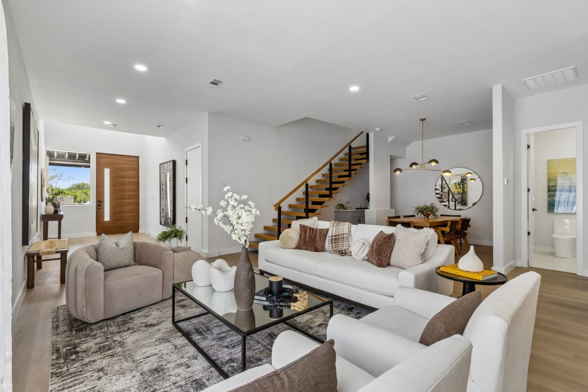 Living space with expansive windows in a completed My Castle Homes residence