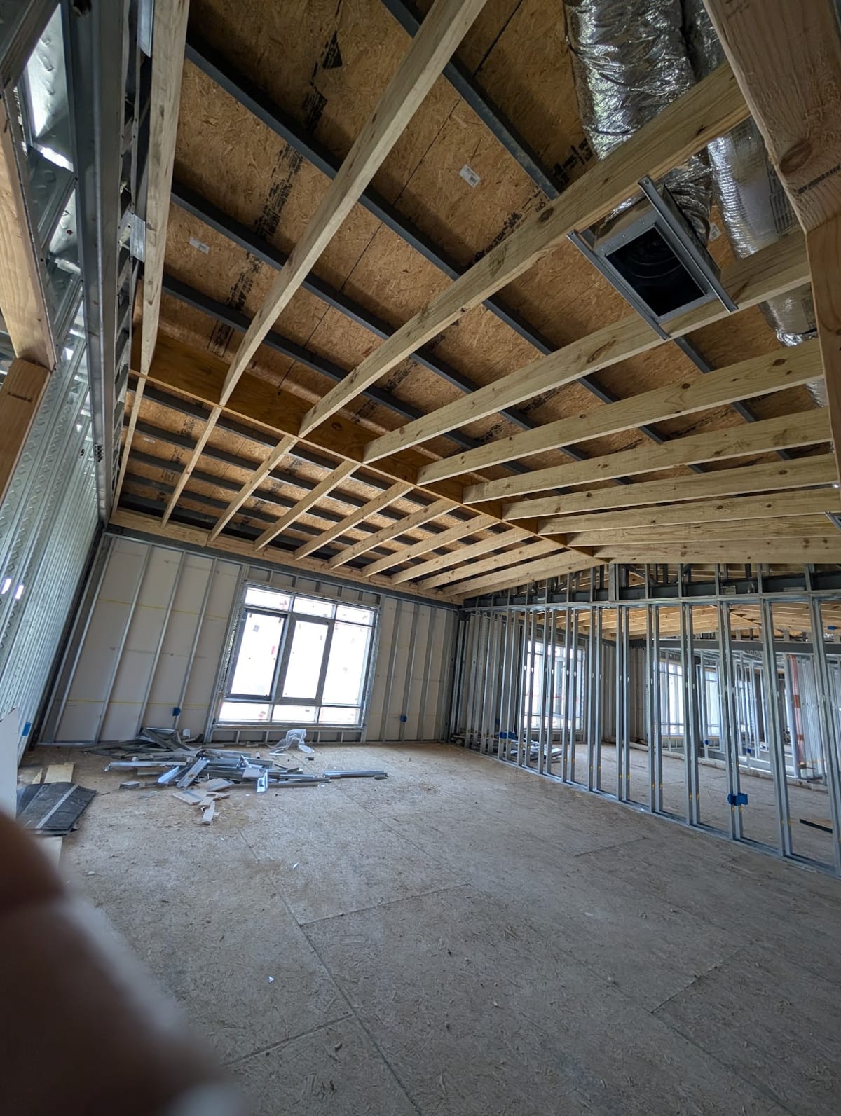 Steel structural framing wrapped in exterior sheathing during construction of a My Castle Homes build