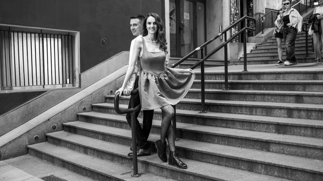 Photo of a couple on a staircase