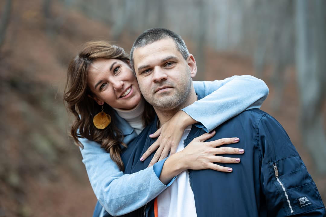 Couple in the autumn forest