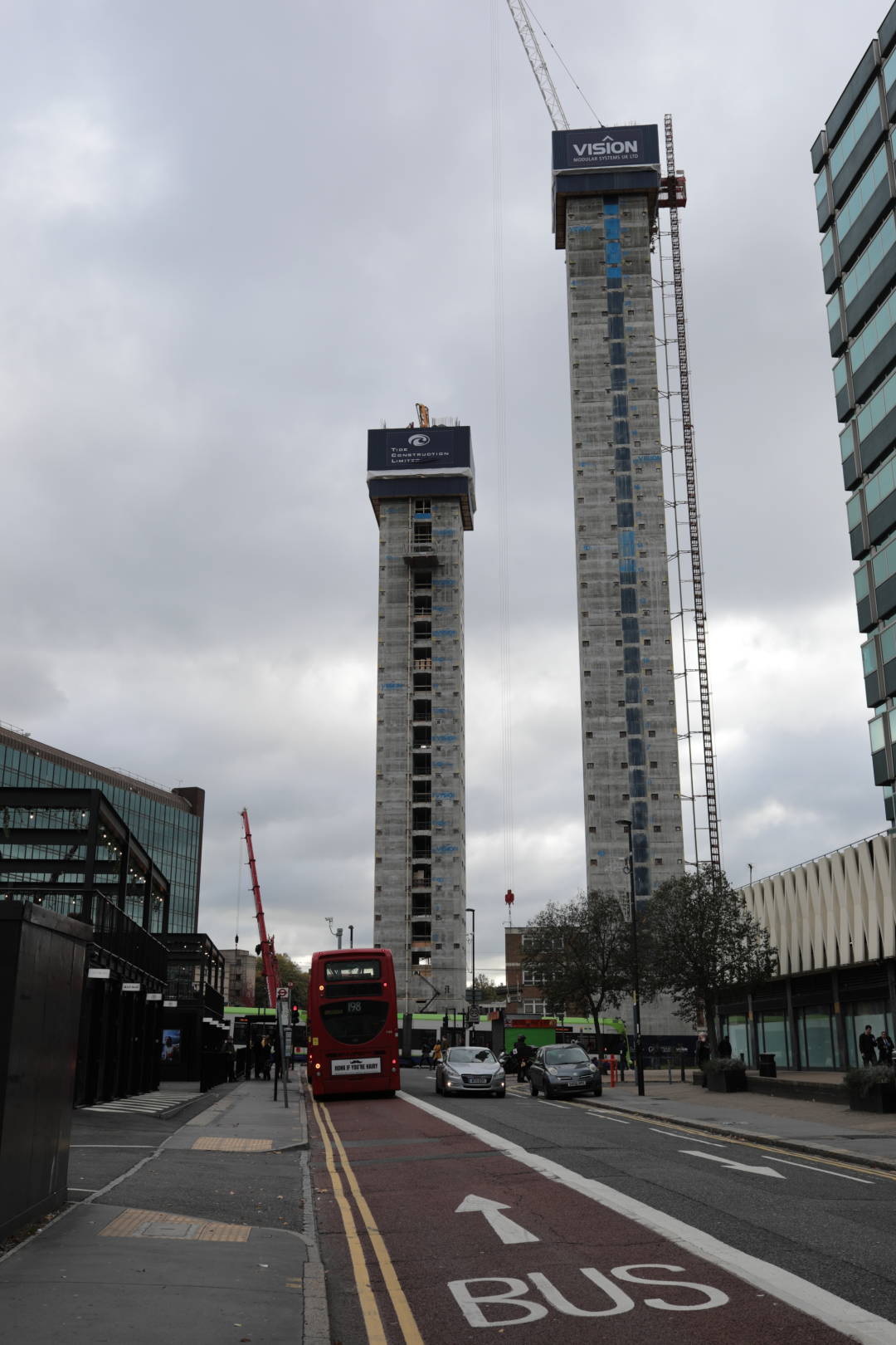 Photo of two tall building cores from far away