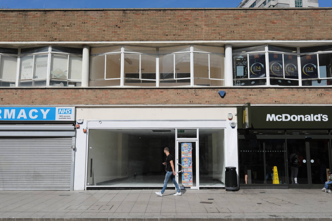 Photo of an empty unit on a retail street