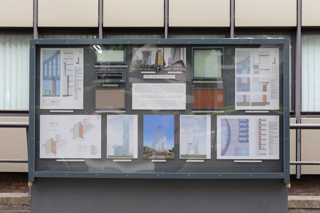 Photo of a sign showing building materials and diagrams for a building project